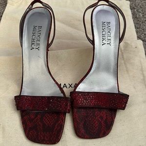 Lipstick red rattlesnake leather shoes.